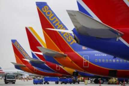  Southwest Airlines' ticket price includes two free checked bags, but Alaska Airlines and...
