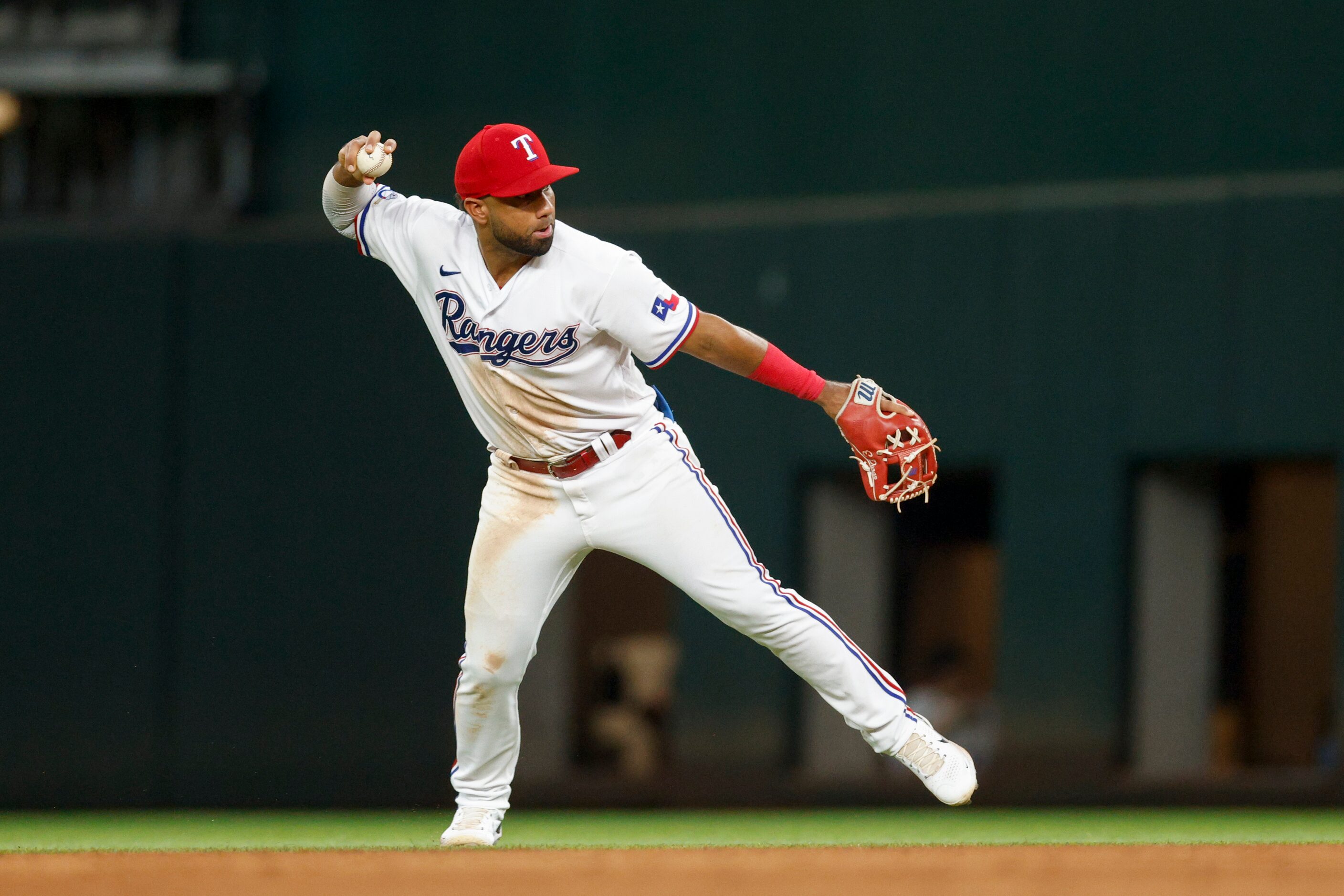 Texas Rangers third baseman Ezequiel Duran (70) turns a double during the eighth inning of a...