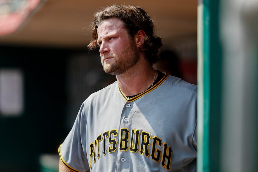 Pittsburgh Pirates starting pitcher Gerrit Cole paces in the dugout after being relieved...