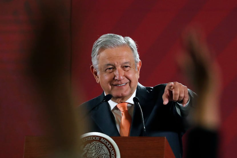 Mexican President Andres Manuel Lopez Obrador answers questions from journalists at his...