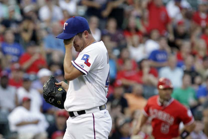 Roy Oswalt #44 of the Texas Rangers pitches against the Oakland Athletics during the first...