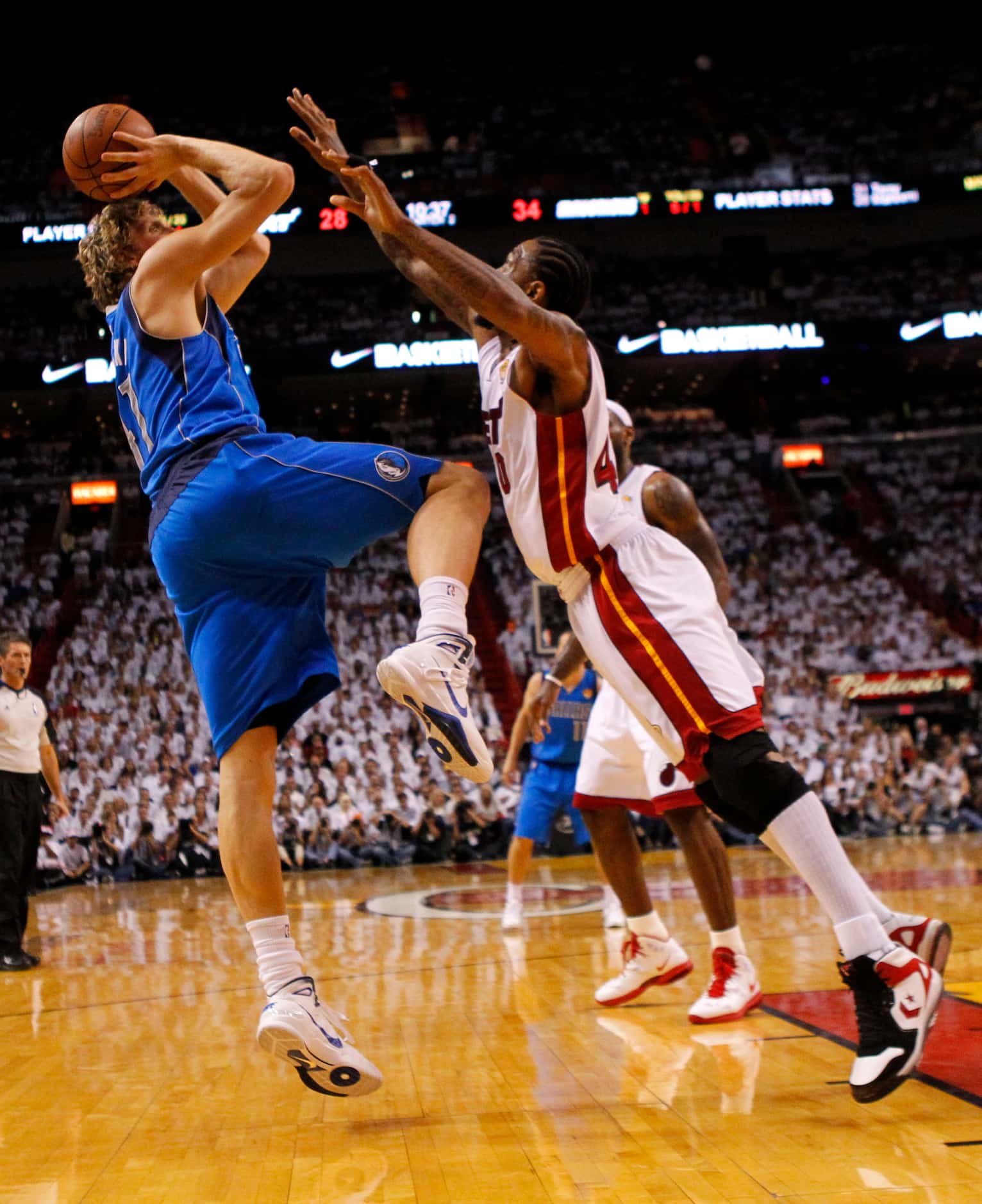 Dallas Mavericks power forward Dirk Nowitzki (41) shoots on Miami Heat power forward Udonis...