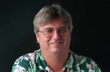 Known for an arsenal of Hawaiian shirts, here's Fraley  from a 1999 staff headshot.