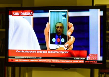 Turkish President Recep Tayyip Erdogan speaks on CNN-Turk via a Facetime call on July 15,...