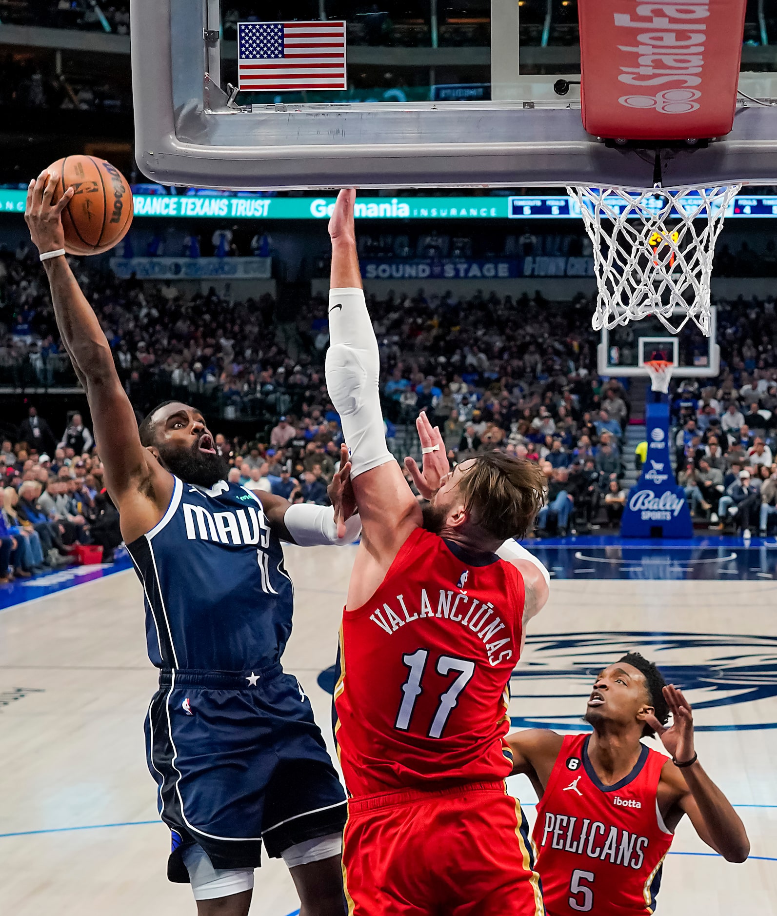 Dallas Mavericks forward Tim Hardaway Jr. (11) shoots over New Orleans Pelicans center Jonas...