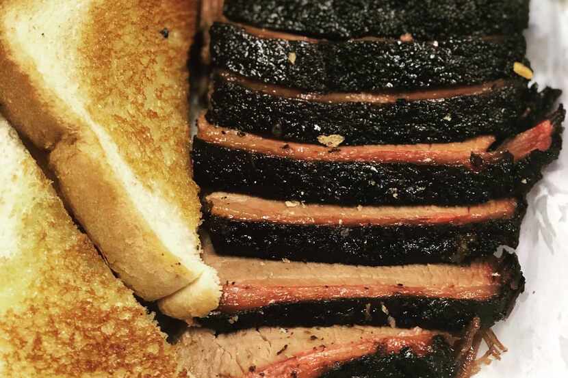 Smoke 'N Ash BBQ in Arlington blends traditional Texas barbecue with Ethiopian foods, like...