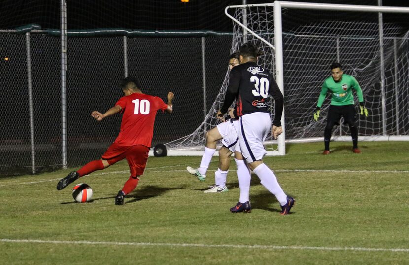 FC Wichita's Nelson Landeverde tries to cut back against the NTX Rayados defense in their...