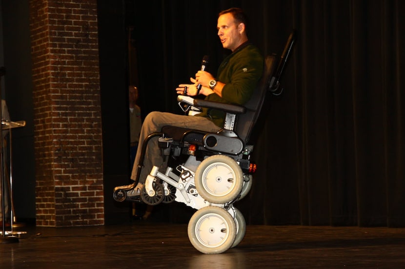 Chief Warrant Officer Gary Linfoot demonstrates his robotic wheelchair.