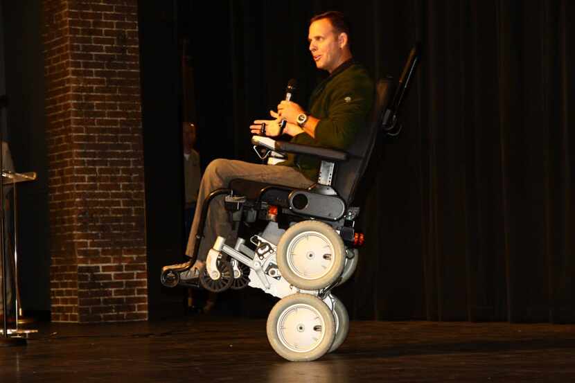 Chief Warrant Officer Gary Linfoot demonstrates his robotic wheelchair.