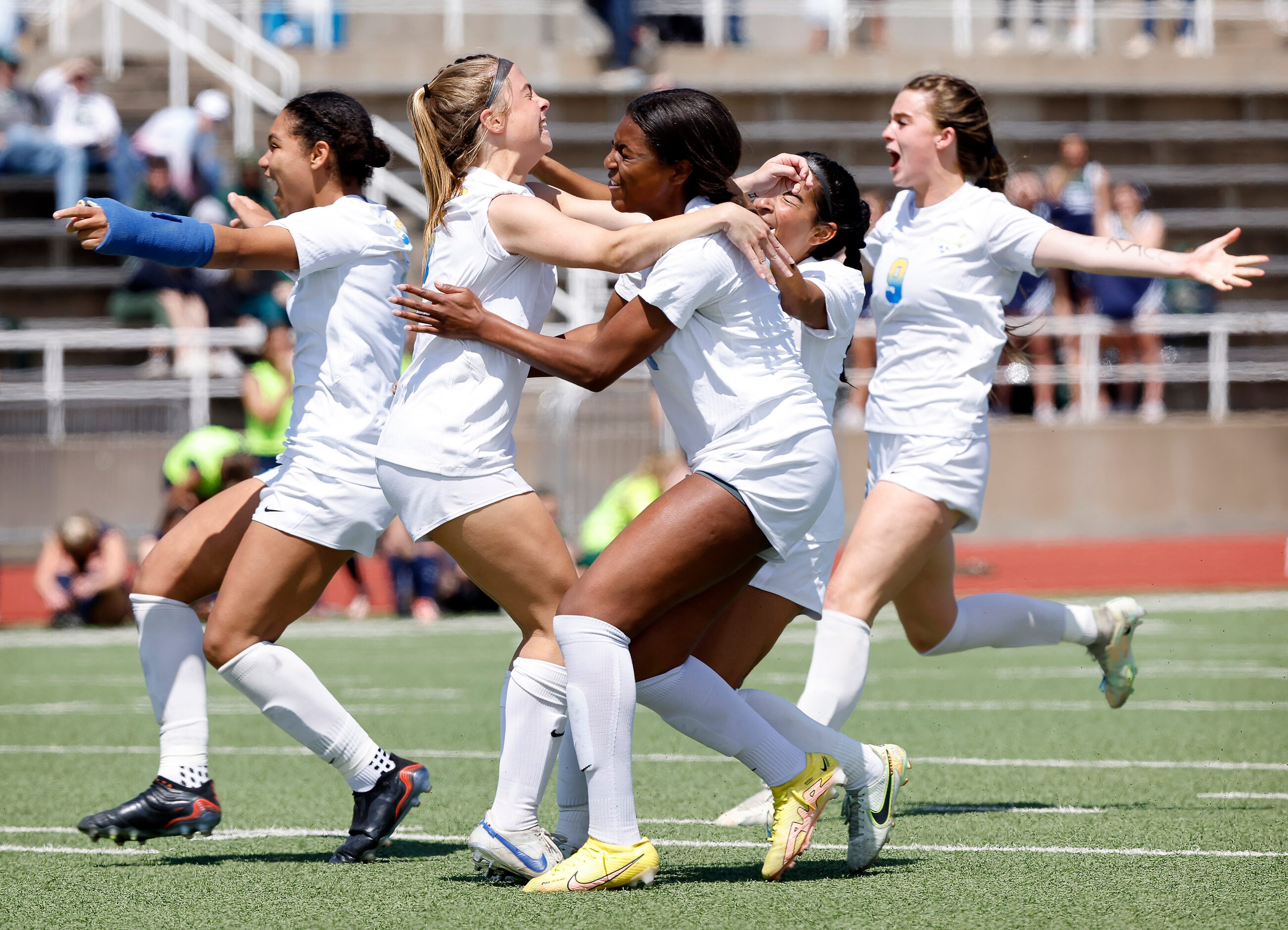 Frisco’s Taylor Vance (second from left) is congratulated by teammate Kori Ballard after she...