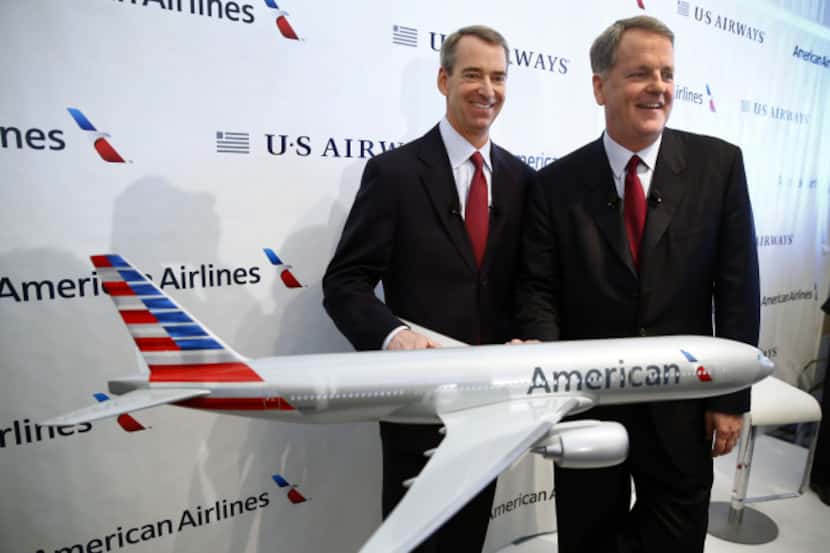 American Airlines CEO Tom Horton (left) and US Airways CEO Doug Parker announced the...
