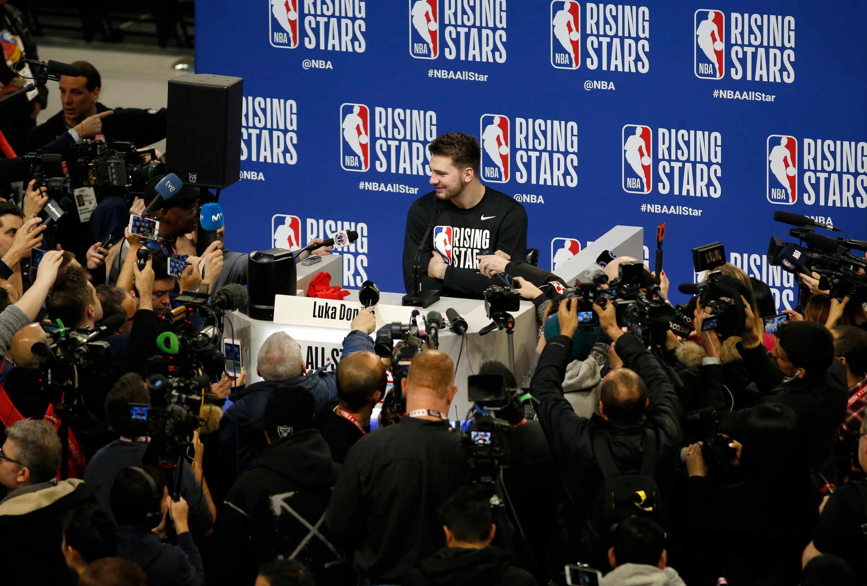 Dallas Mavericks forward Luka Doncic (77) answers questions from the media during NBA Rising...