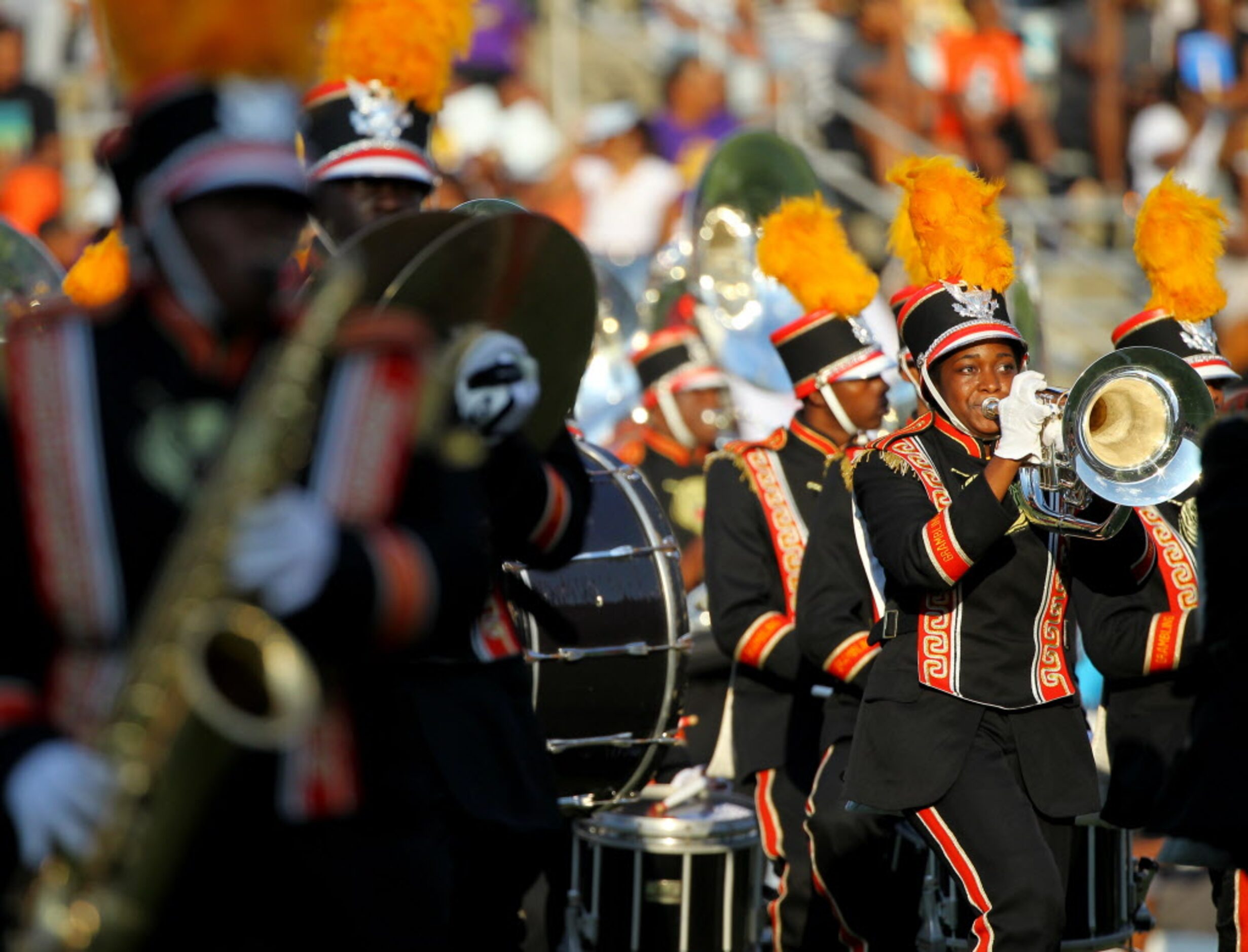 The Grambling State marching band performs during halftime during a college football game...