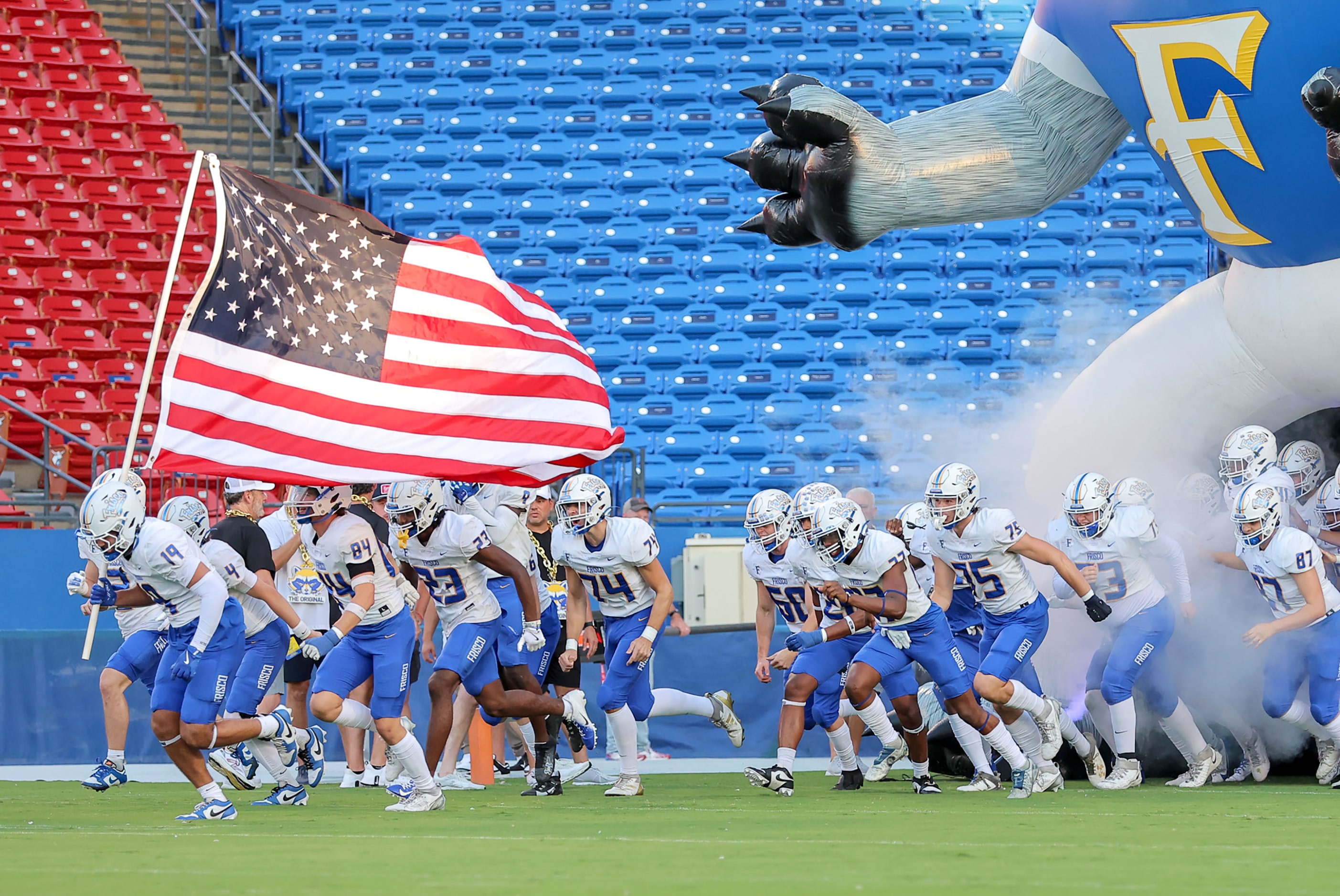 The Frisco Raccoons enter the field to face Frisco Heritage in a District 5-5A Division I...