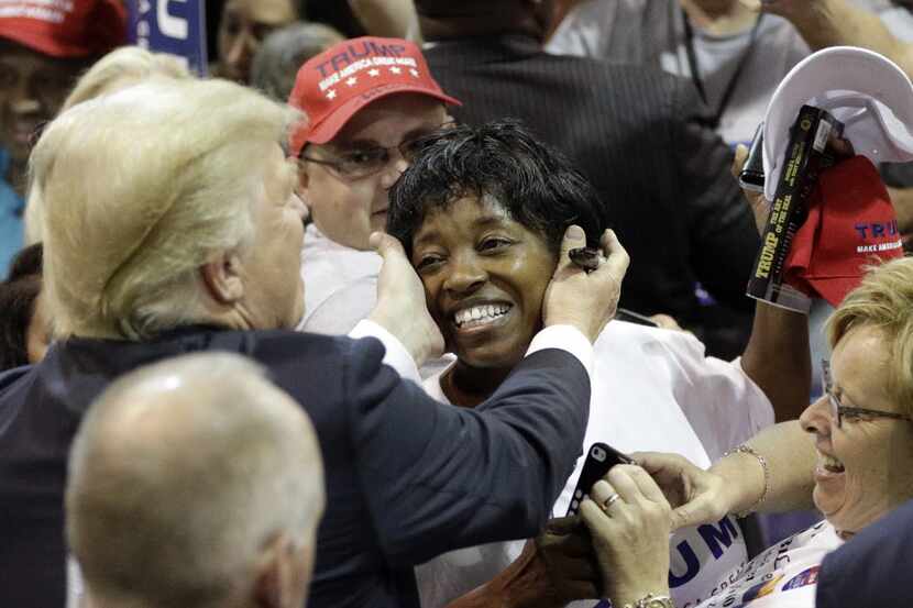 Donald Trump embraced this black supporter at a June rally in The Woodlands, but polls show...