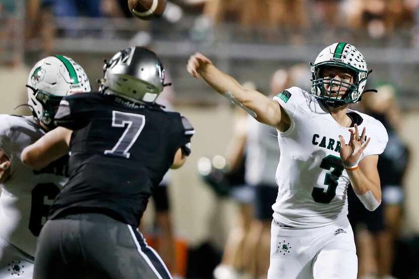 Southlake Carroll's Quinn Ewers (3) attempts a pass in a game against Denton Guyer during...