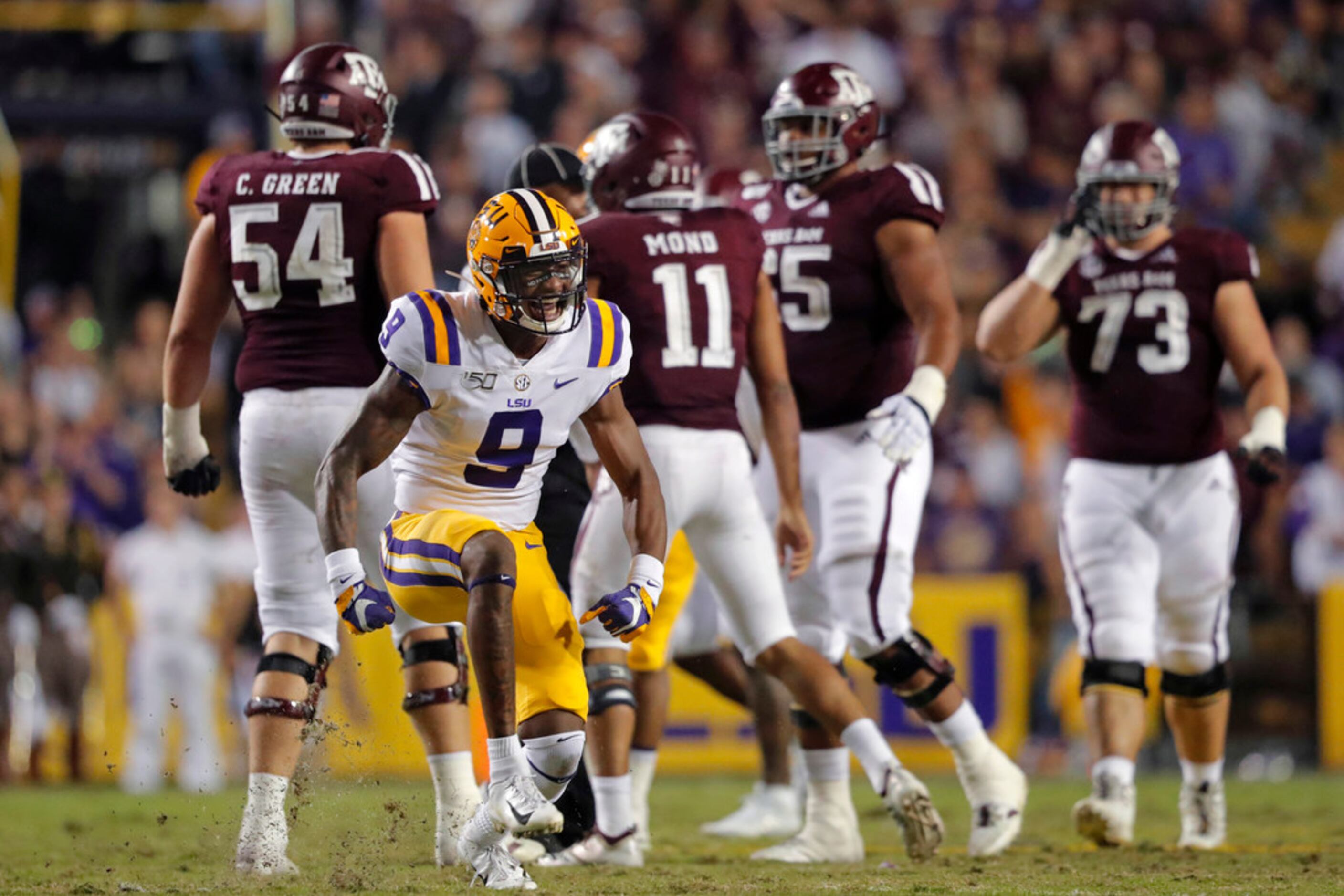 LSU safety Marcel Brooks (9) celebrates a sack during the first half of the team's NCAA...