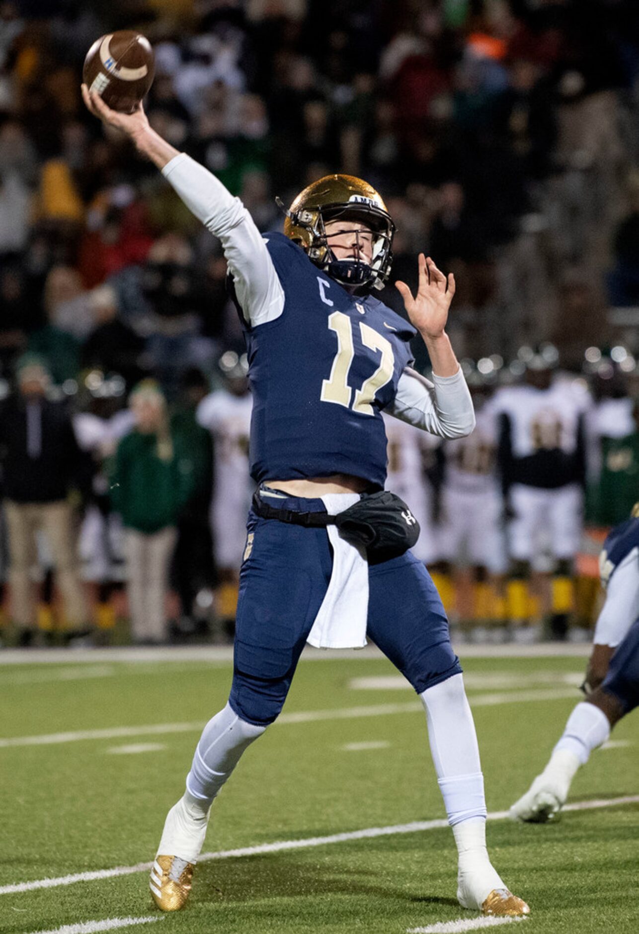 Jesuit senior quarterback Rance Holman (17) lofts a pass into the end zone against Longview...