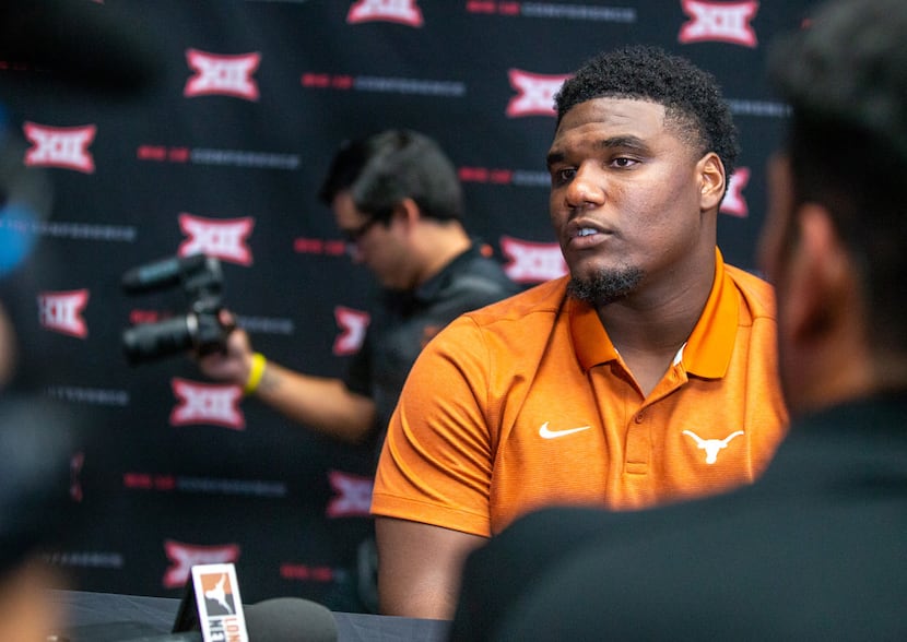 Texas defensive end Malcolm Roach speaks with reporters during the breakout session of Big...