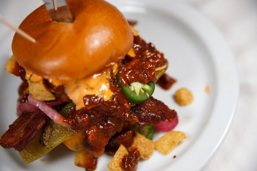 This is the Frito pie burger at Slater's 50/50. HellO.