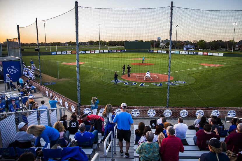 Fans take their seats to watch Plano West face Plano in a high school baseball game on...