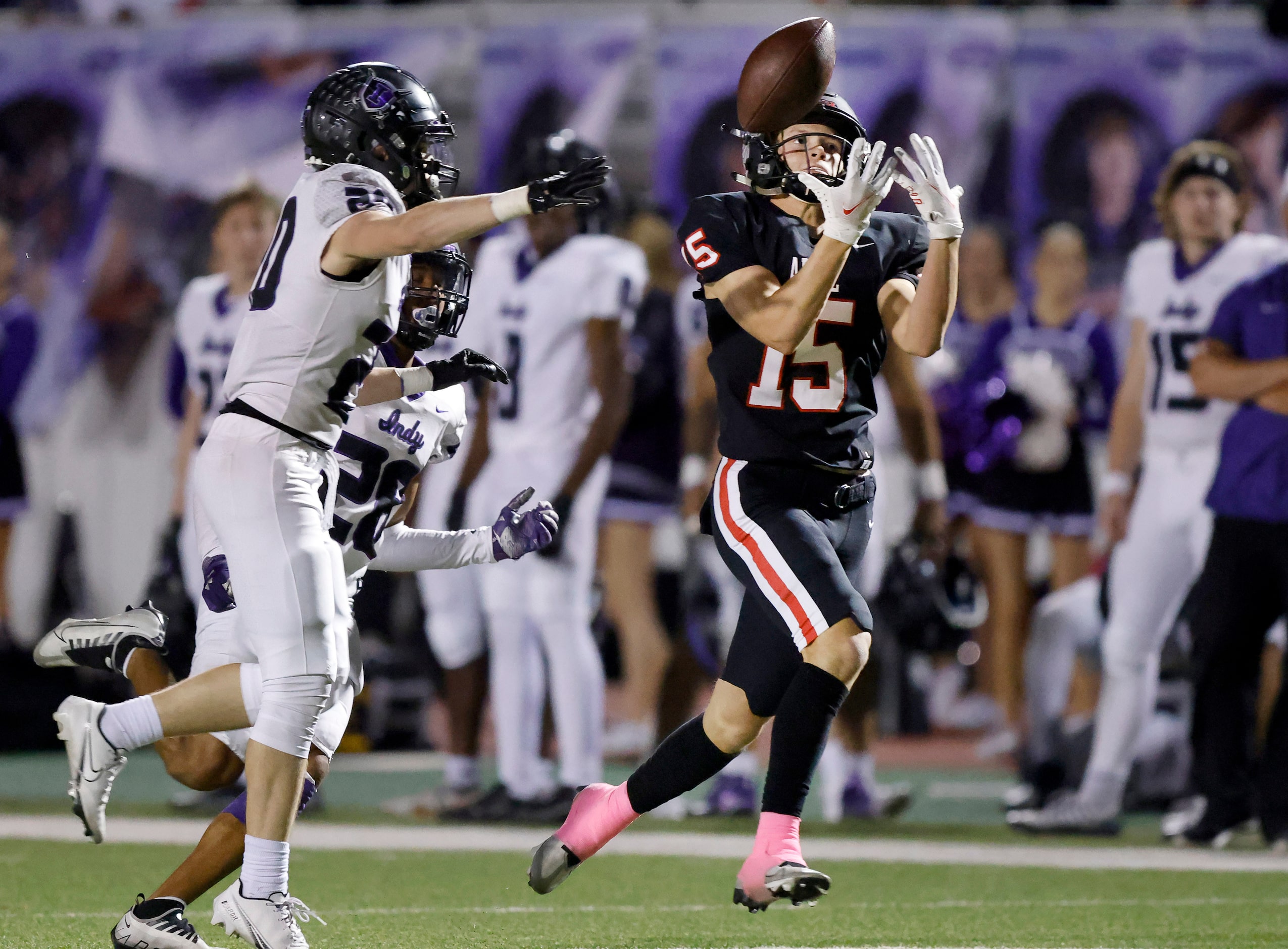 Argyle receiver Maquire Gasperson (15) bobbles an over the shoulder pass as Frisco...