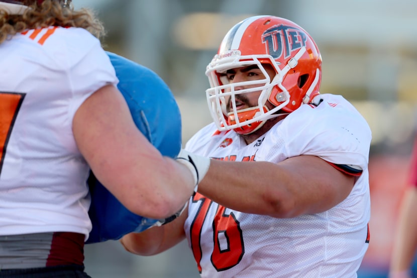 North Squad OG Will Hernandez of UTEP (76) runs drills during the North team's practice for...