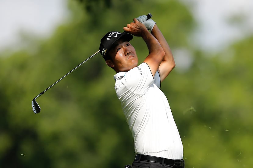 FORT WORTH, TEXAS - MAY 25:  Kevin Na of the United States plays a shot on the 17th hole...