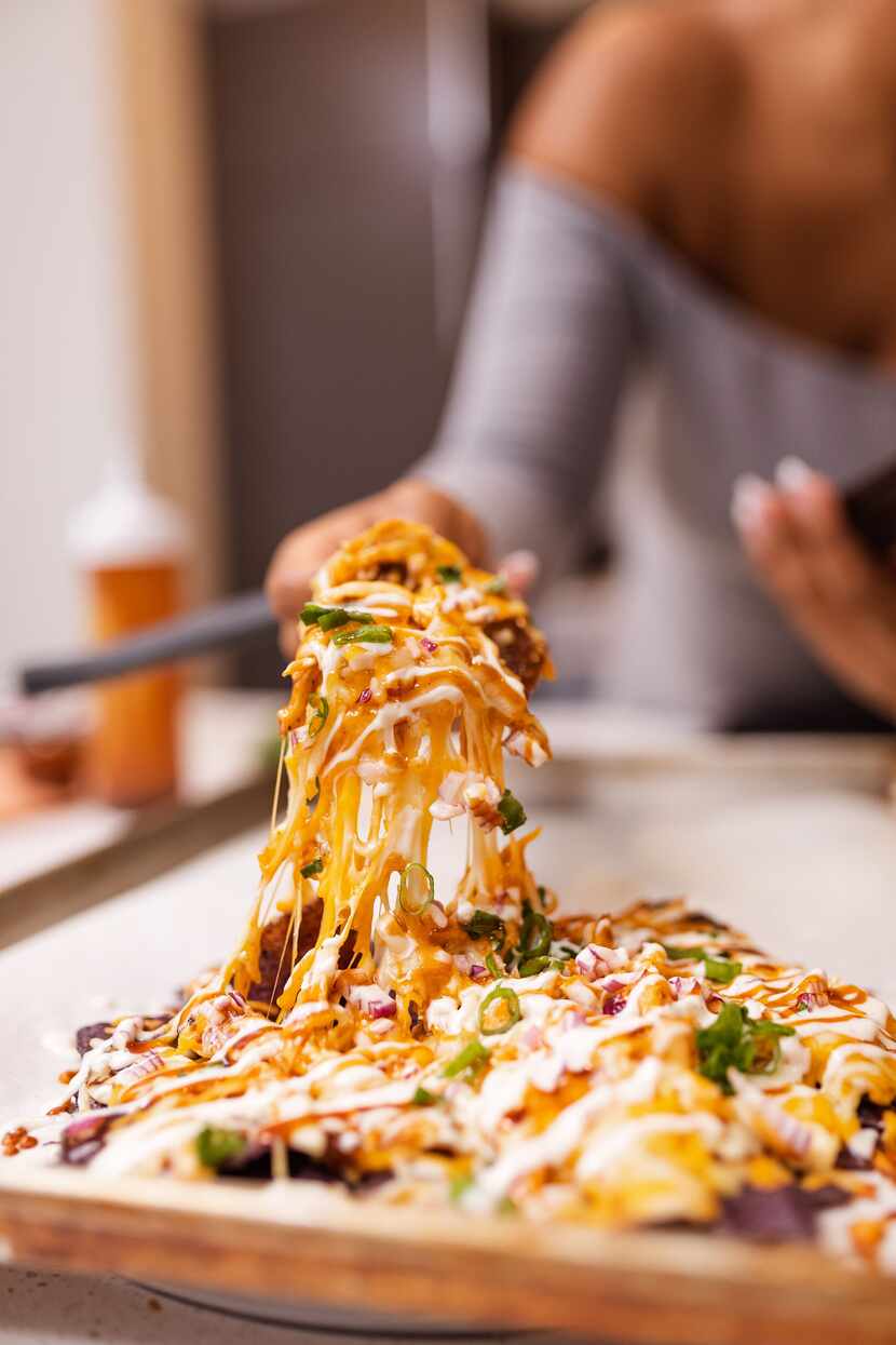 Private chef Gabrielle McBay of Dallas makes sheet pan bbq chicken nachos.