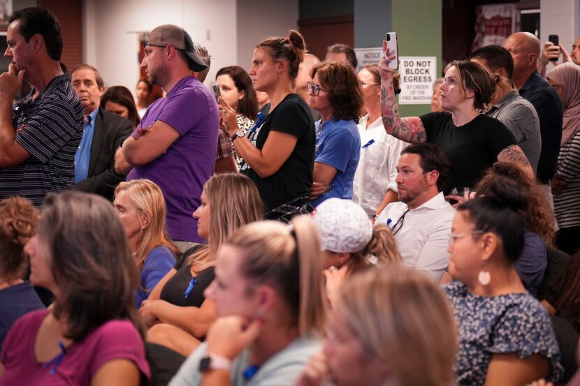 People wait to speak during a Prosper ISD board meeting Aug. 29. Parents in the district are...