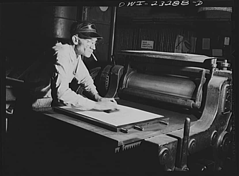Man making a press matte at The Dallas Morning News in April 1943.
