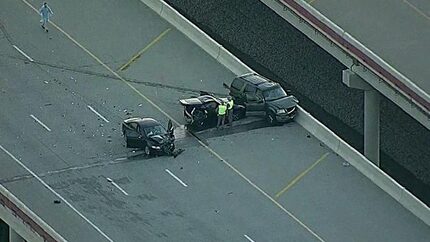 Bush Turnpike near Belt Line Road was closed for several hours while authorities...