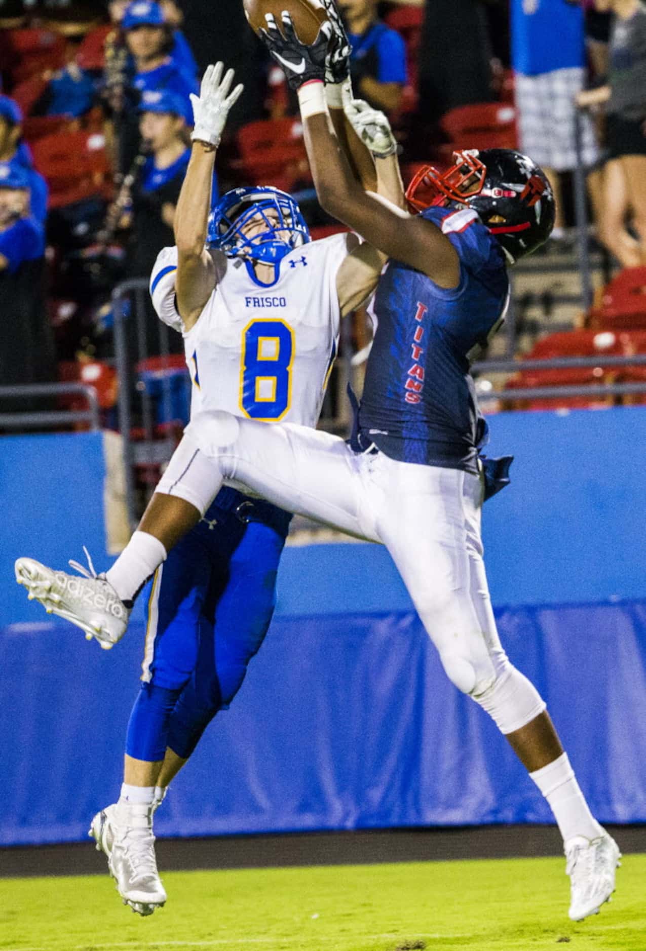Frisco Centennial wide receiver Kenny Nelson (5) catches a pass in the end zone for a...