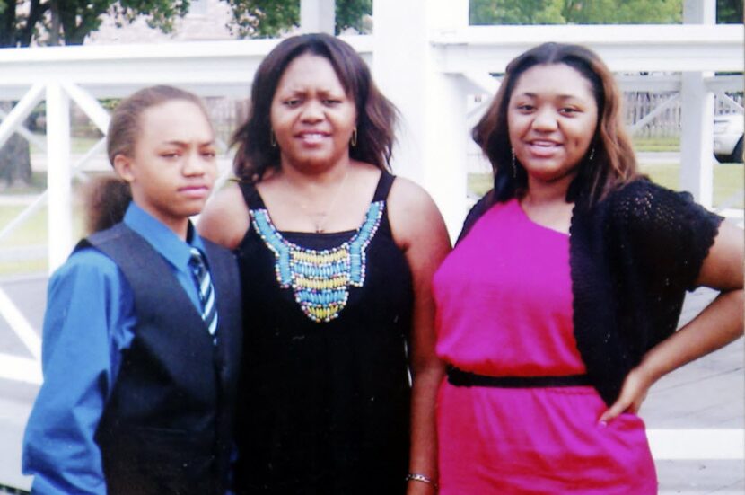 Storm Malone (left) was injured and his mother, Toya Smith (center), and sister, Tasmia...