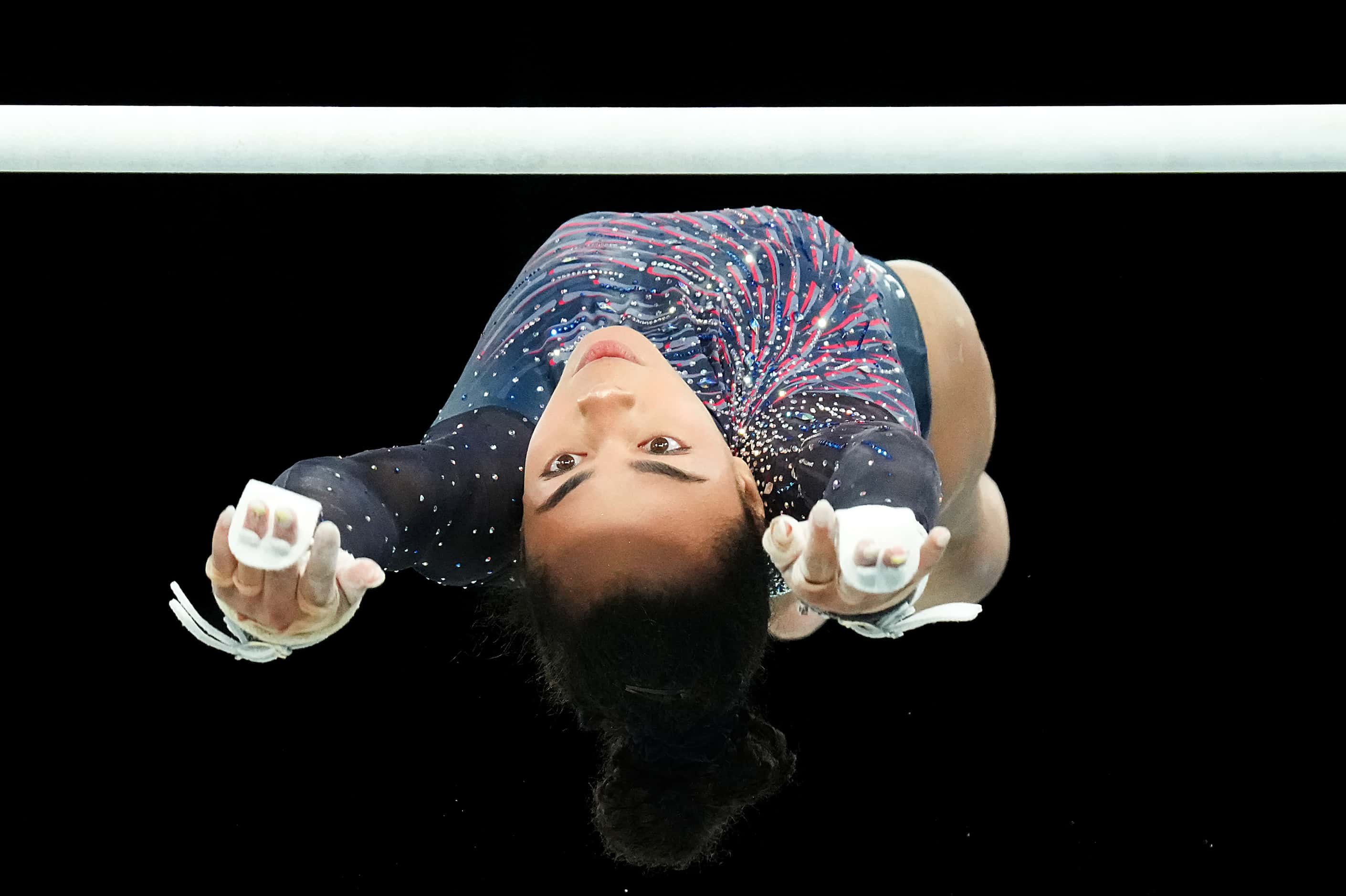 Hezly Rivera of the United States practices on the uneven bars during women’s gymnastics...