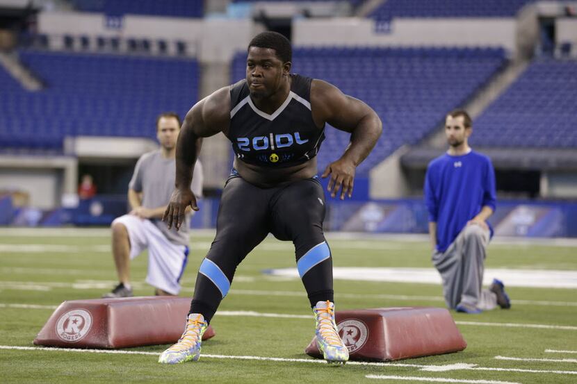 Florida State defensive lineman Timmy Jernigan runs a drill at the NFL football scouting...