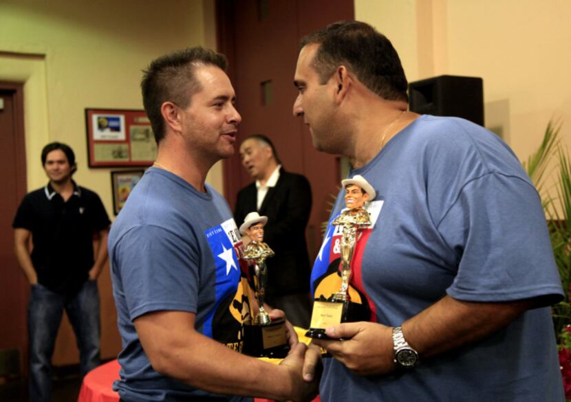 Justin Martinez (left), winner of most creative, shakes Isaac Rousso's hand during the Big...