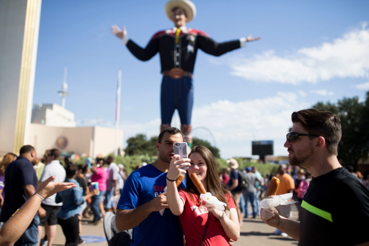 Terry Carpenter (center left), and Brooke Carpenter (center right), both of Lewisville,...