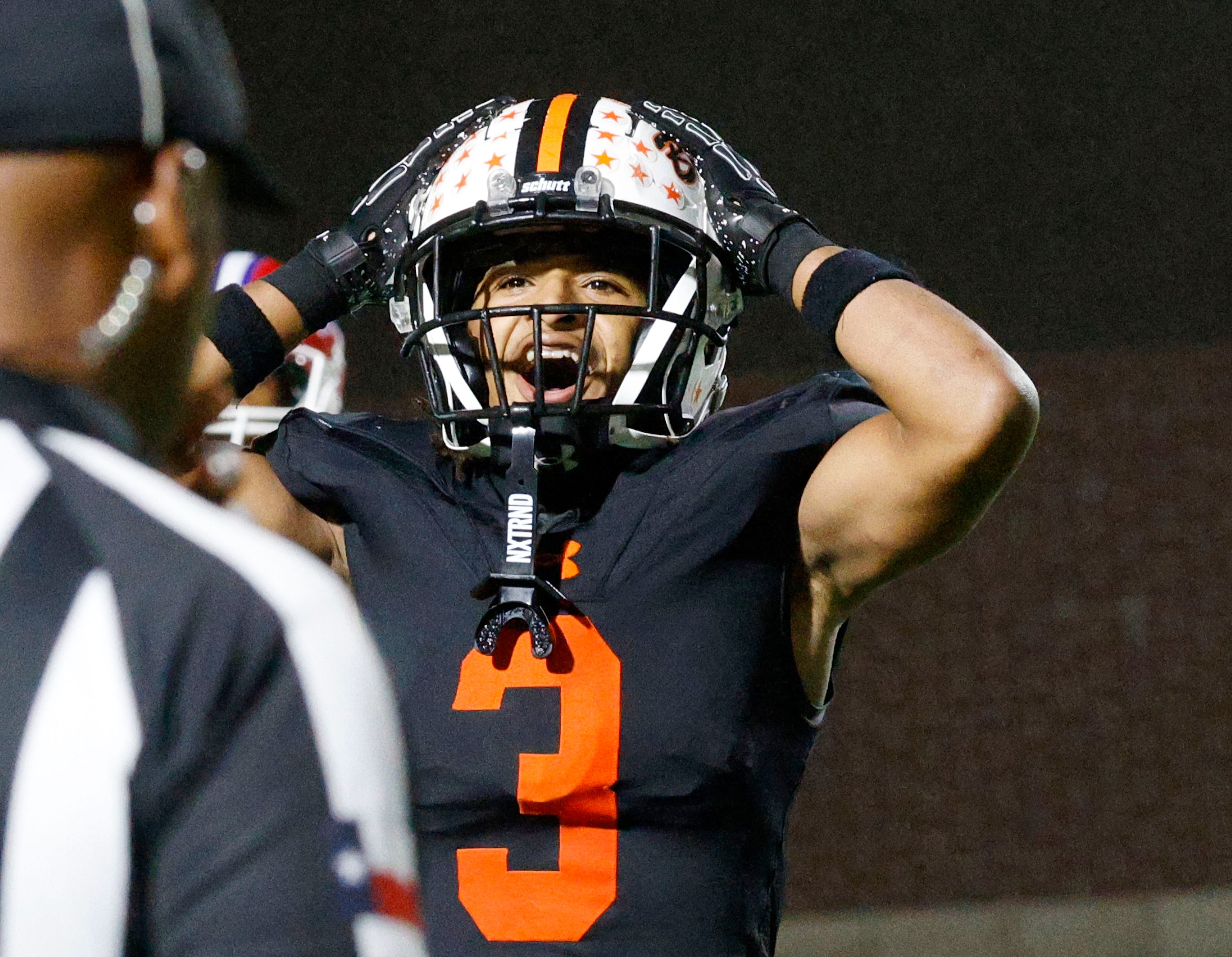 Haltom's Keenan Jackson (3) reacts after scoring a touchdown in the second half of a high...