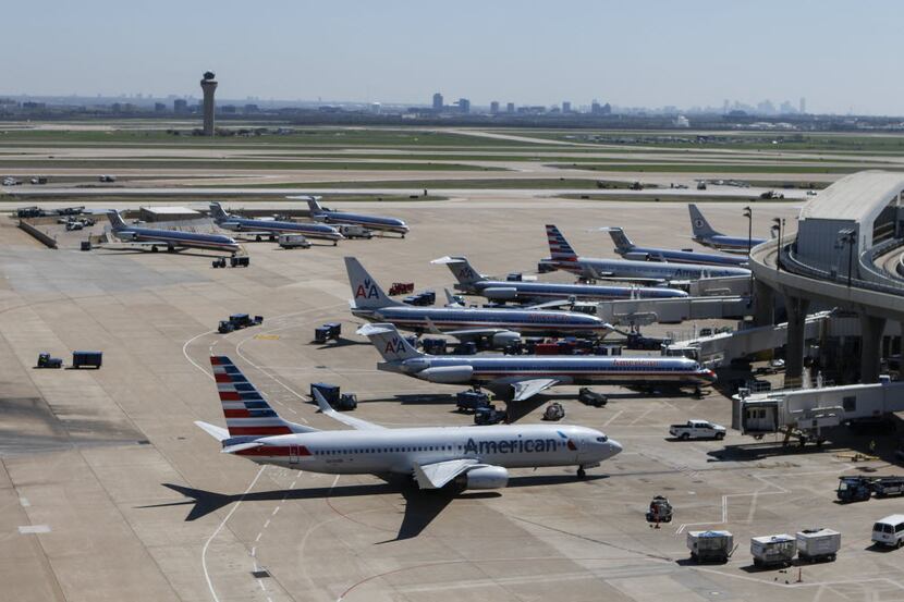 Rows of planes seen from inside the American Airlines control tower at Dallas / Fort Worth...