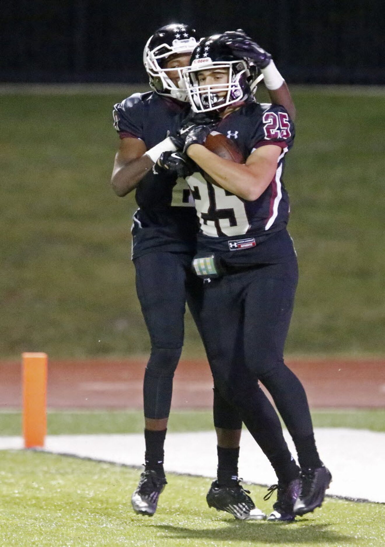 Wylie High School wide receiver Dru Thomas (8) congratulate Wylie High School running back...