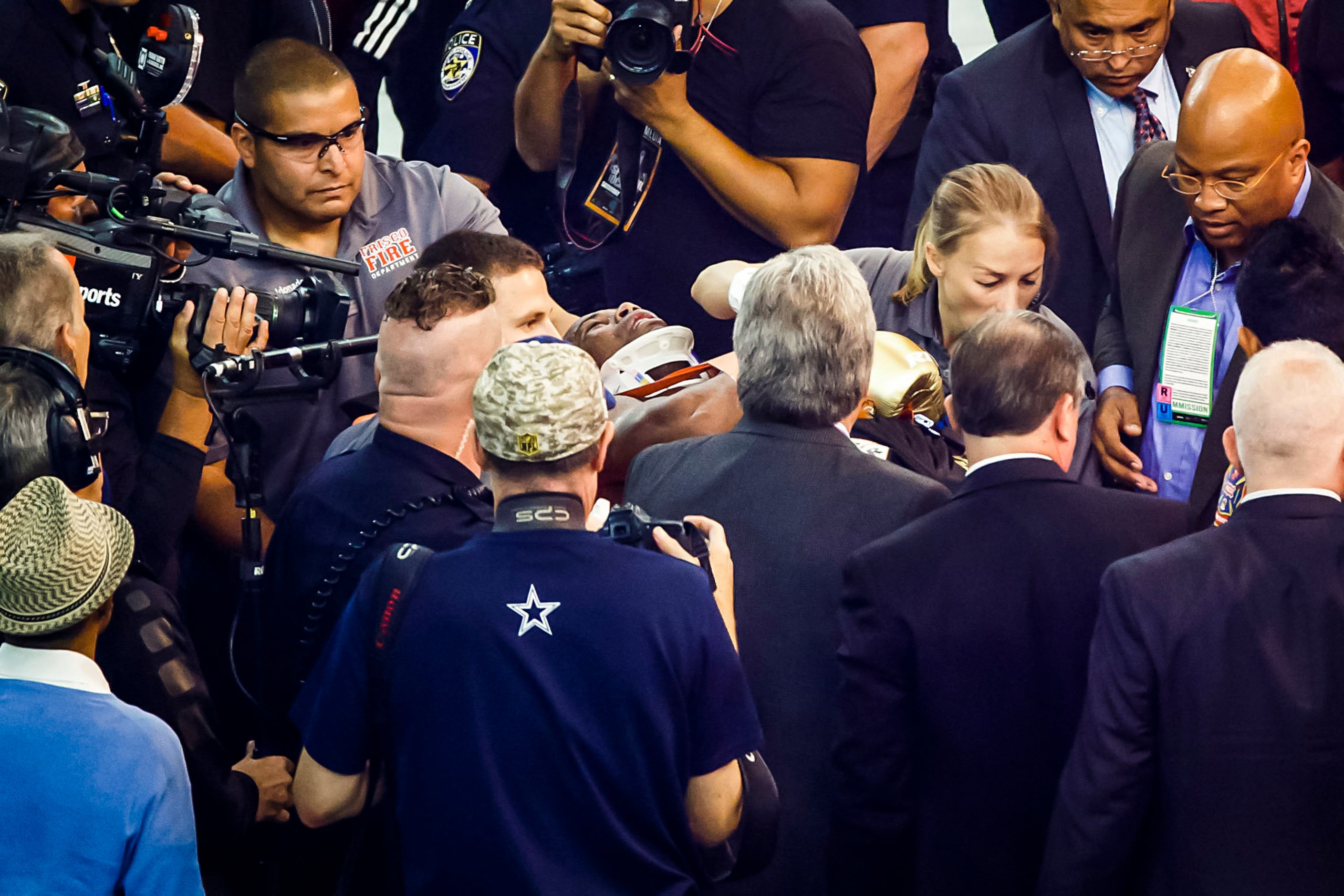 Javier Fortuna, of La Romana, Dominican Republic, leaves the venue on a stretcher after he...