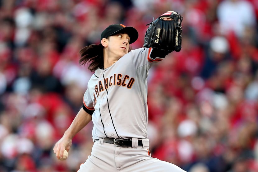 CINCINNATI, OH - OCTOBER 10:  Tim Lincecum #55 of the San Francisco Giants pitches against...