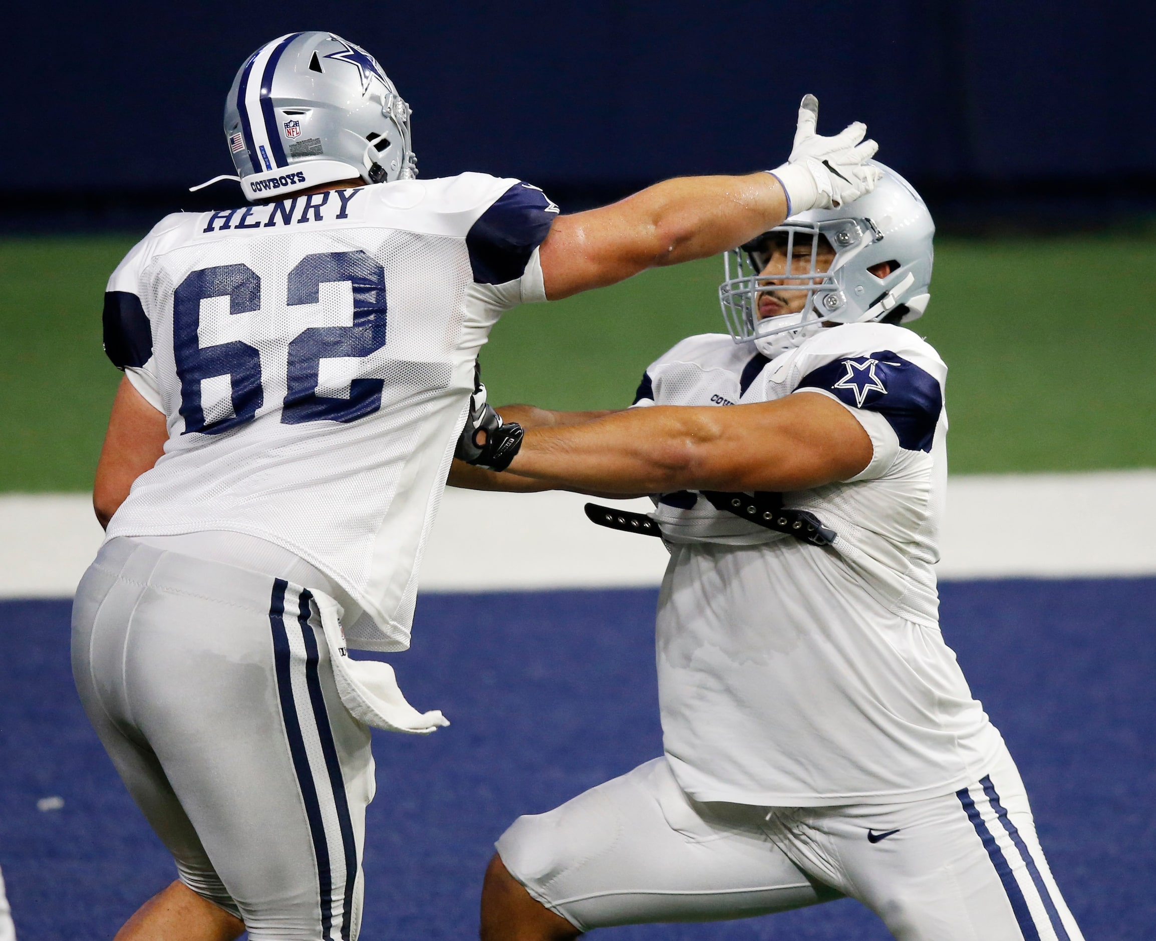 Dallas Cowboys offensive tackle Isaac Alarcón (60) blocks Dallas Cowboys center Marcus Henry...