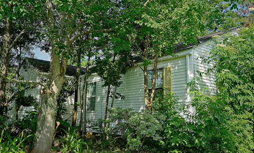  Musician Janis Joplin's childhood home in Port Arthur has a Texas Historical Commission...