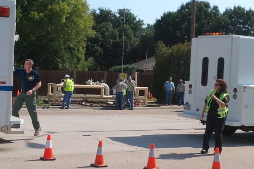 Plano police and the FBI investigate at the scene of a gas main that was tampered with.
