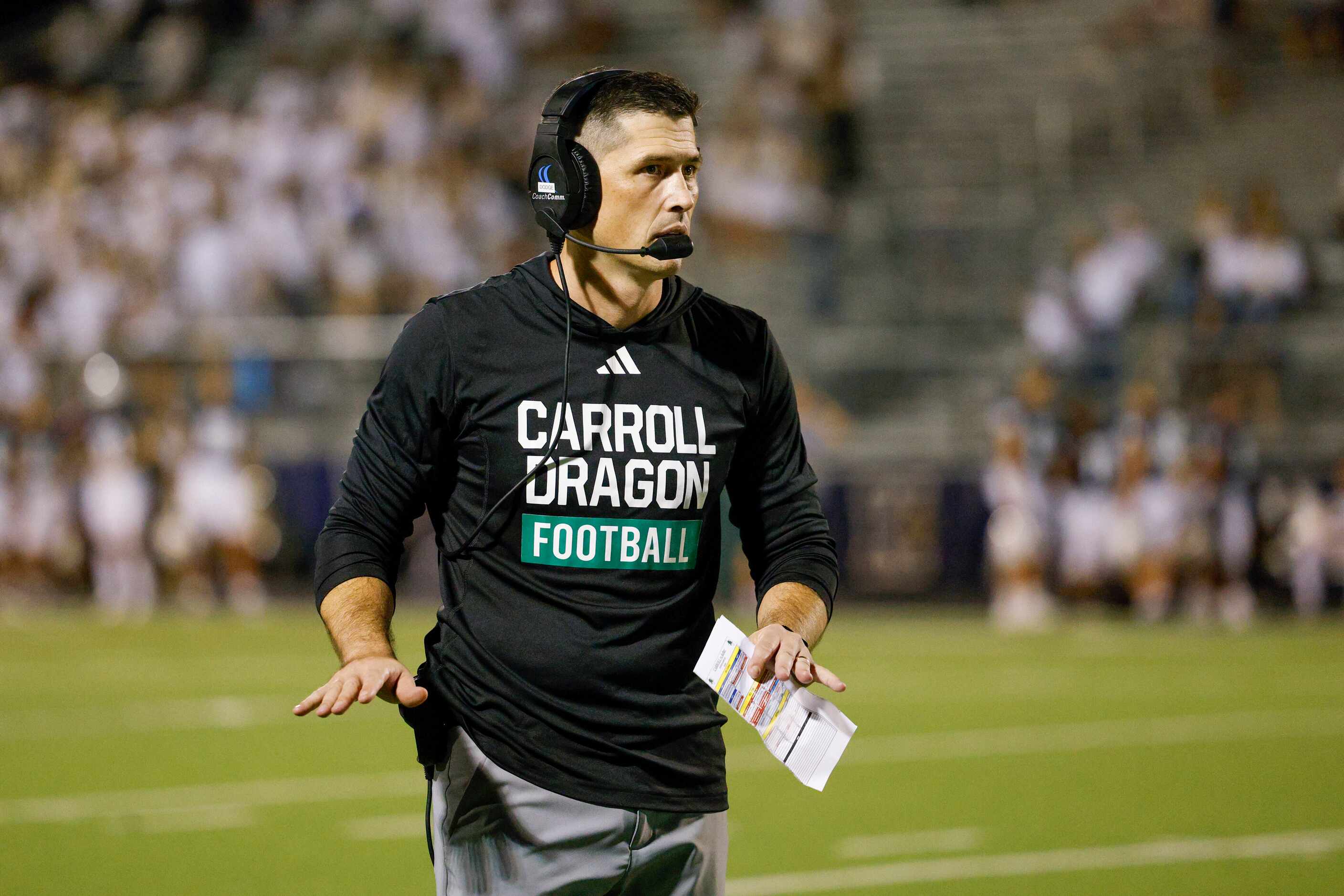 Southlake Carroll head coach Riley Dodge motions to his team during the second half of a...