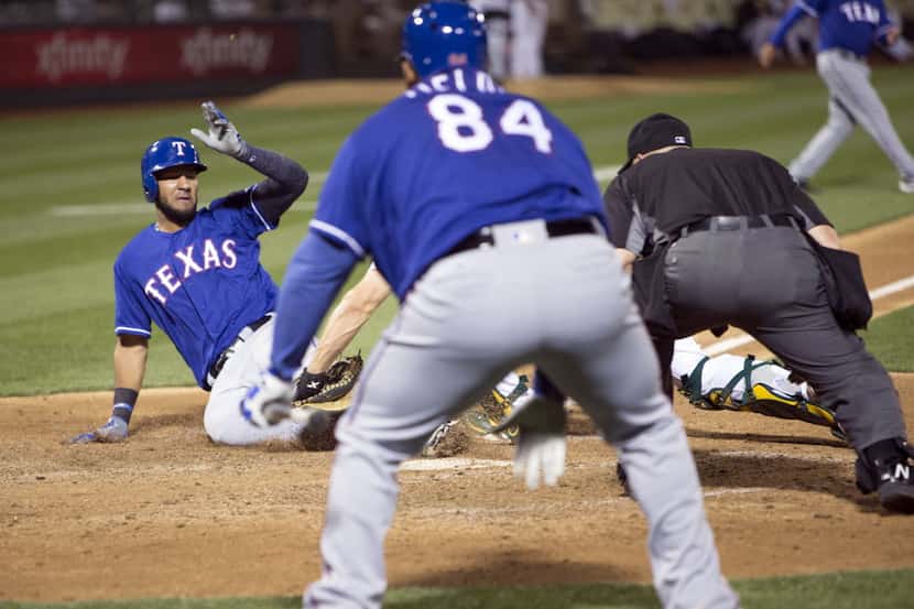 May 17, 2016; Oakland, CA, USA; Texas Rangers right fielder Nomar Mazara (30) is tagged out...