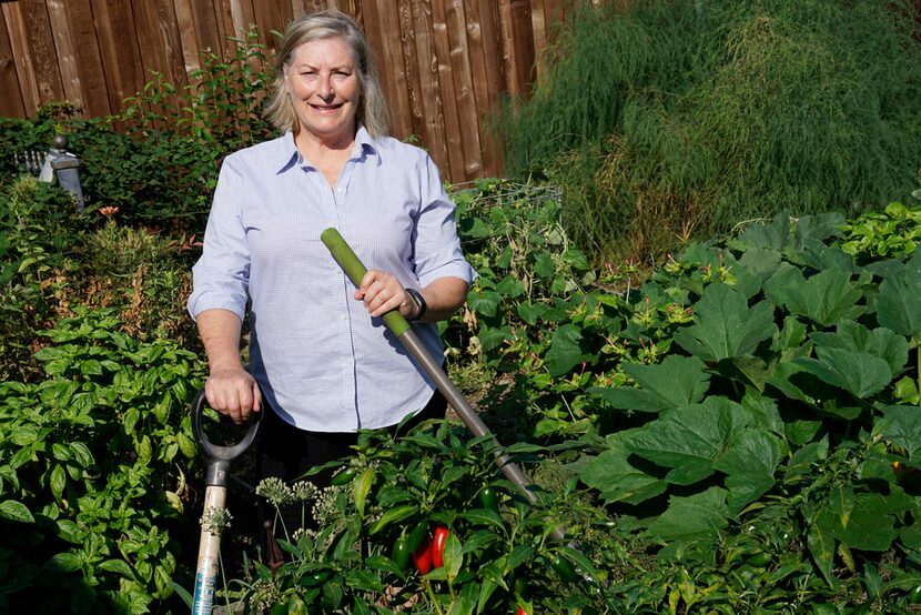 Amanda Vanhoozier hangs out in the garden at her home in Coppell. Since retiring from the...