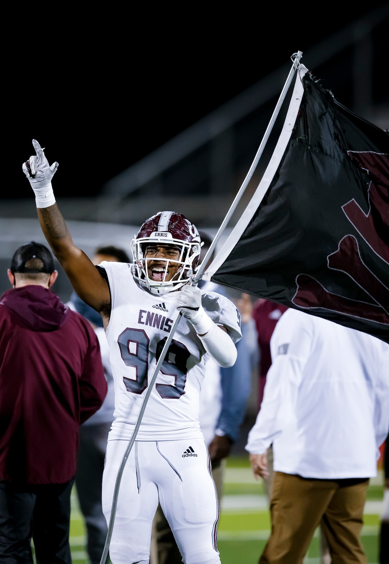 Ennis senior defensive lineman Deryous Stokes celebrates a 38-14 win over North Forney after...